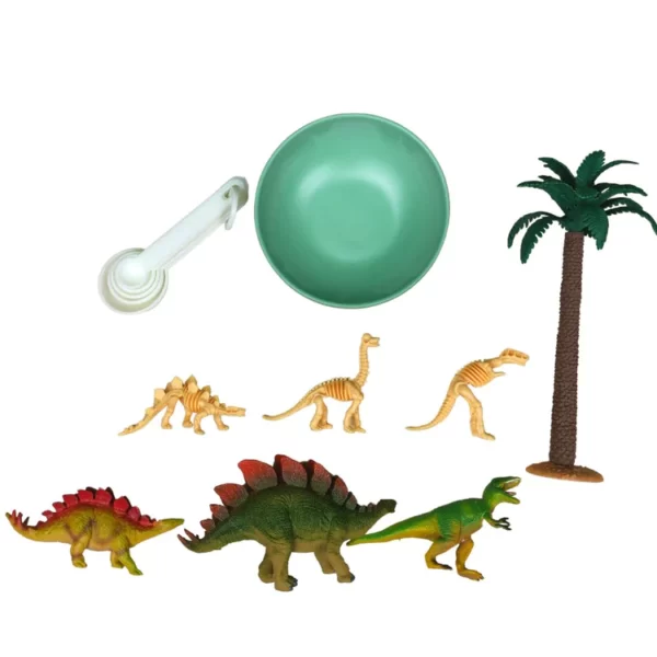 items from dinosaur play set laid out